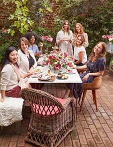 family at table outside