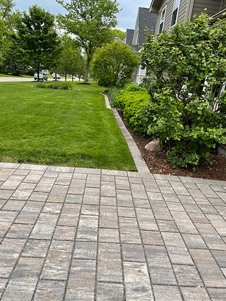 grass and brick pavers