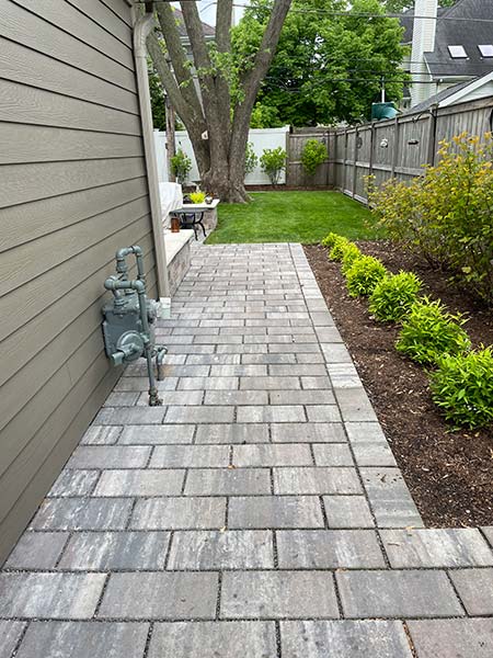 brick pavers on side of house